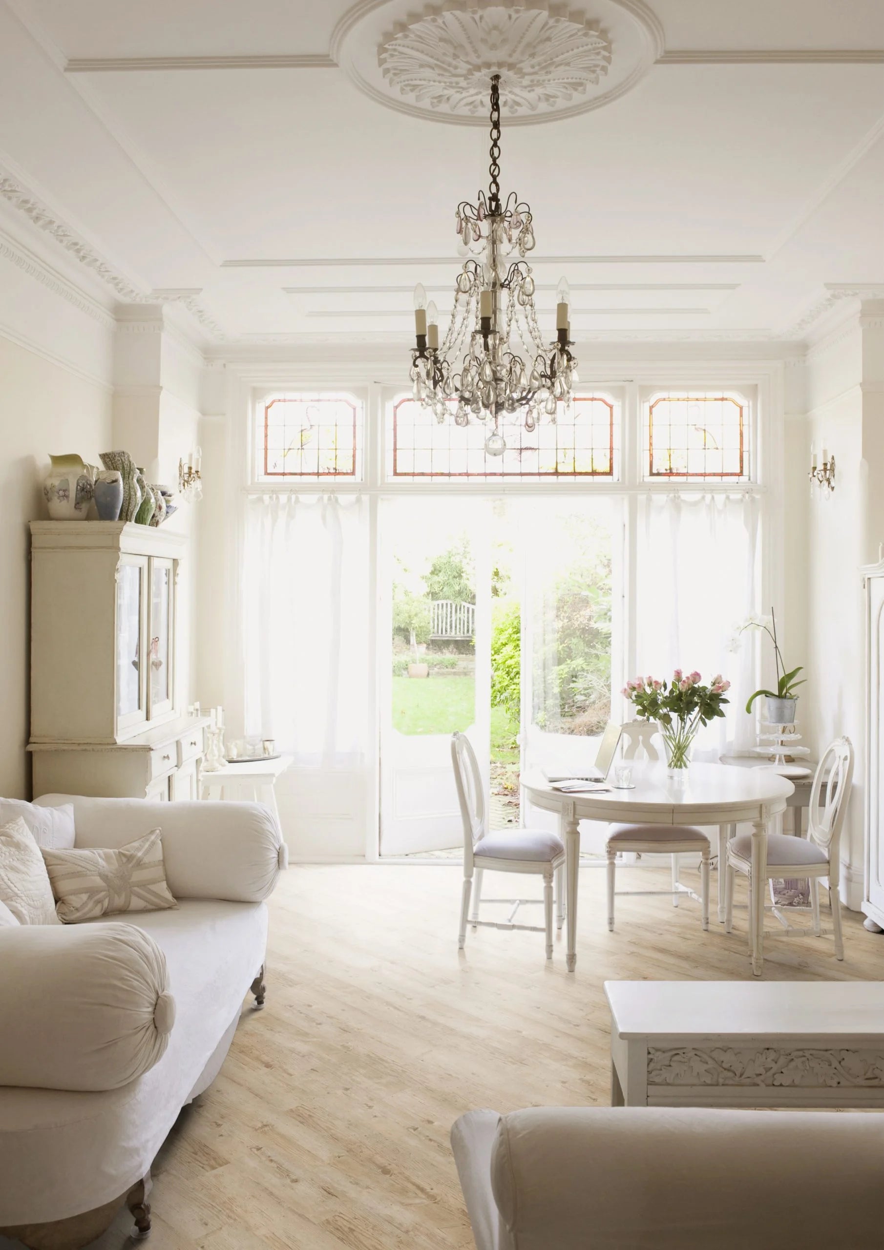 Luvanto Design Wood Plank flooring in Bleached Larch with light wood tones in a cosy lounge living room