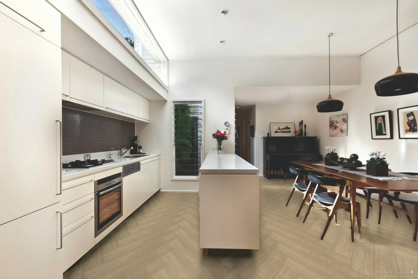 Luvanto Herringbone flooring in Natural Oak in a contemporary kitchen dining room.