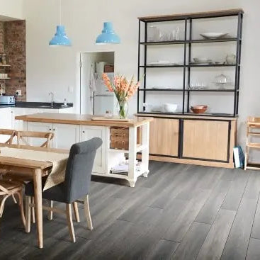 Midnight ash lvt plank flooring in a kitchen