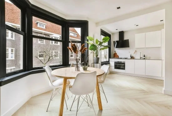 Traditional White Oak Luvanto Herringbone flooring installation in a kitchen dining room