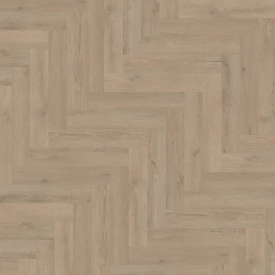 Close-up of Willow Oak LVT herringbone pattern, showcasing the light wood tone and elegant finish.