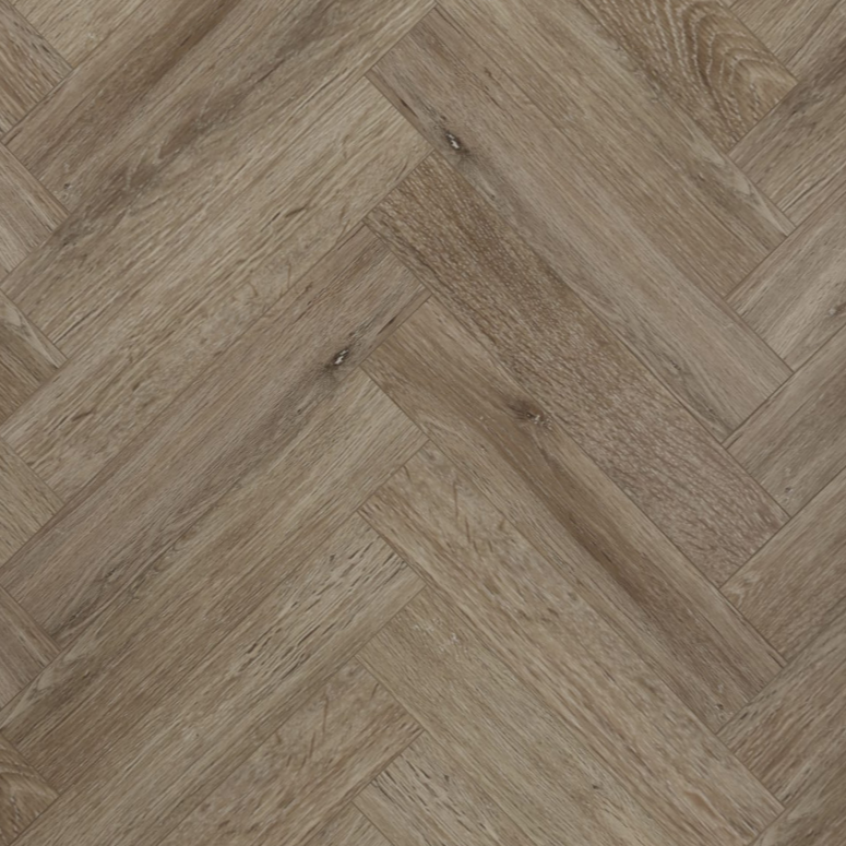 Tromso Herringbone LVT in Woodland Fir, showcasing natural wood tones and a classic herringbone pattern, perfect for adding rustic charm to interiors.