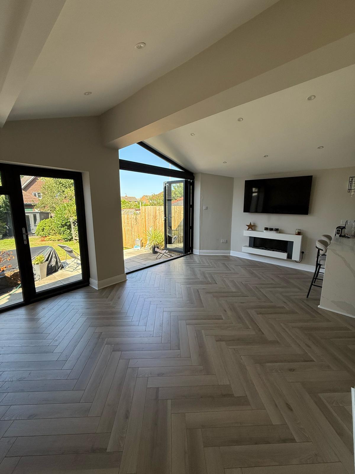 Grey Oyster Herringbone Laminate 12mm Click Fit Flooring