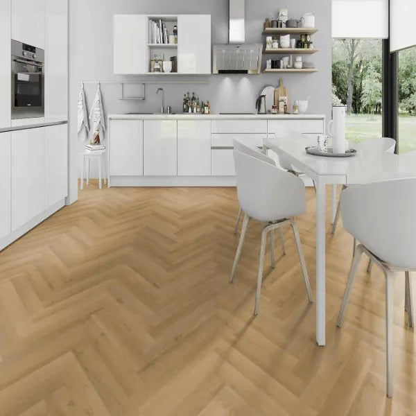 Harvest Oak Herringbone laminate flooring with warm oak tones and a sophisticated herringbone pattern.