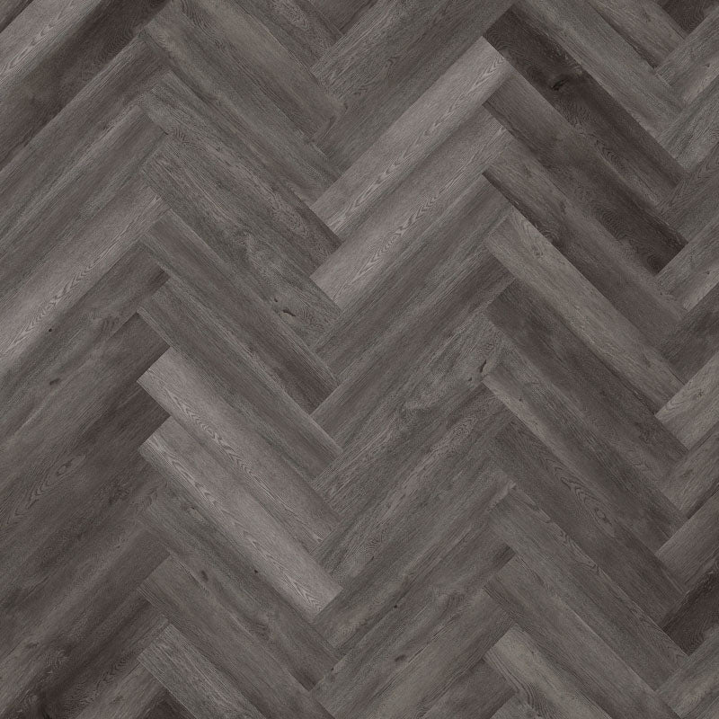 Tromso Herringbone LVT in Slate Grey, showcasing sleek grey tones and a classic herringbone pattern, ideal for modern interiors.