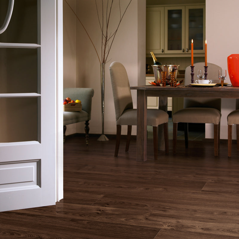 Close-up of Love AQUA Coast laminate flooring showcasing its light, natural wood texture.