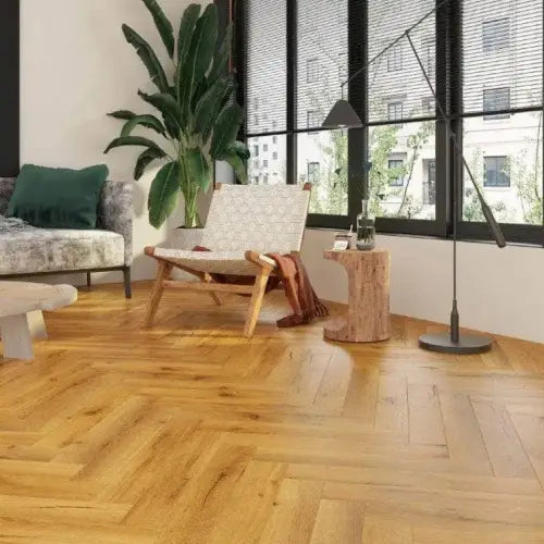 Cedar Oak 12mm Herringbone Laminate flooring in a spacious living room with a wooden effect.