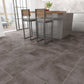 Grey LVT Flooring in a kitchen with barstools and a kitchen island